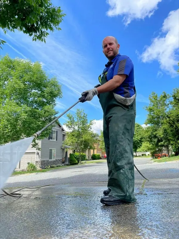 Pressure washing a house